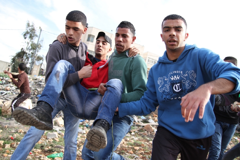 Palestinští běženci z okolí Ramalláhu po střetu s izraelskými vojáky (2. února 2014).