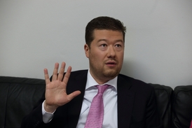 Předseda Úsvitu Tomio Okamura.