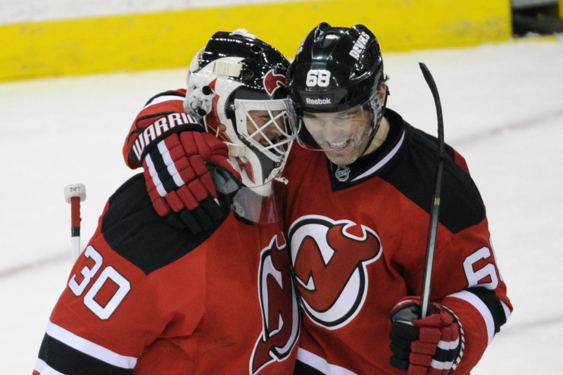 Jaromír Jágr s gólmanem Devils Martinem Brodeurem.