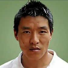 Vězněný tibetský filmař Dhondup Wangčhen.