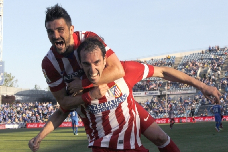 Fotbalisté Atlética Madrid se radují z gólu.