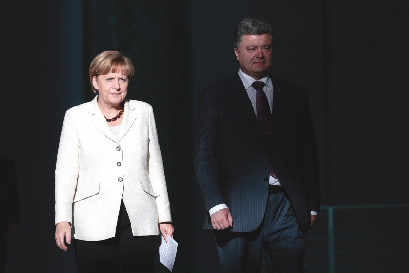 Porošenko u kancléřky Merkelové v Berlíně.