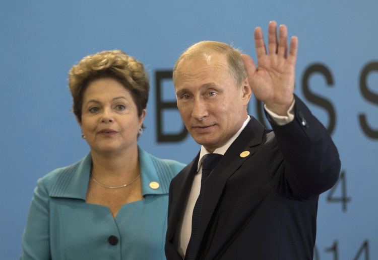 Ruský prezident Vladimir Putin se svbou brazilskou kolegyní.