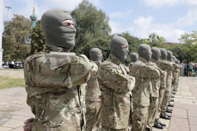 Bojovníci z vlastní vůle. Podle Amnesty International se dopouští válečných zločinů. Bojovníci z vlastní vůle. Podle Amnesty International se dopouští válečných zločinů.