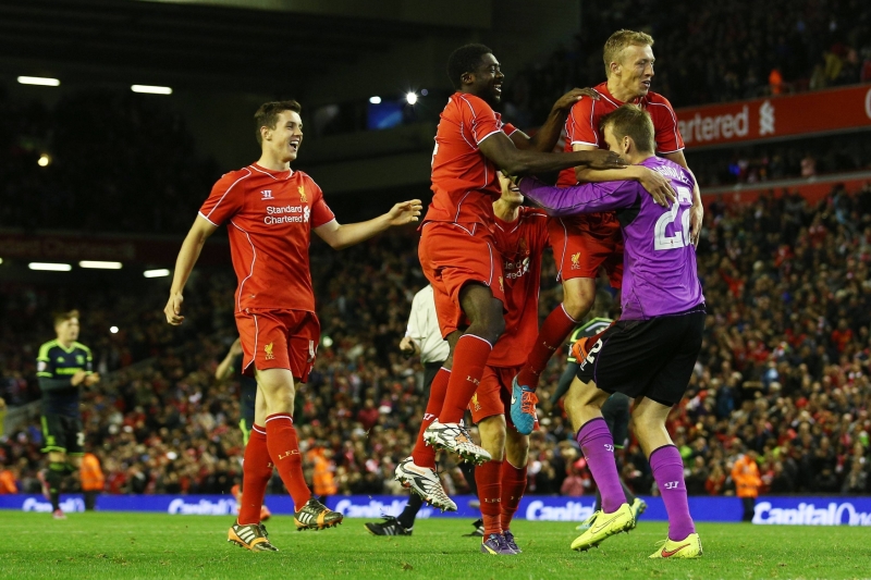 Radující se hráči Liverpoolu.