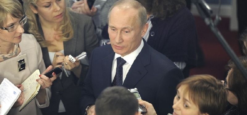 Ruský prezident Vladimir Putin s novináři.