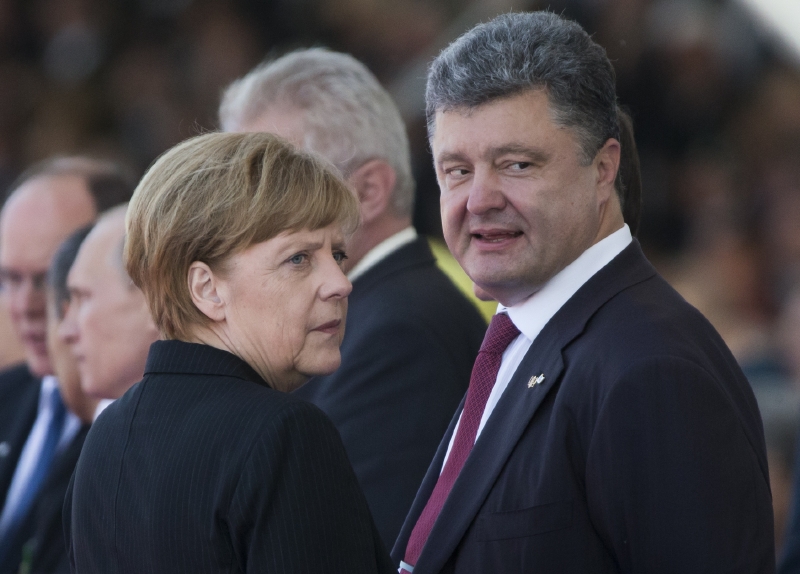 Německá kancléřka Angela Merkelová a ukrajinský prezident Petro Porošenko. Německá kancléřka Angela Merkelová a ukrajinský prezident Petro Porošenko.
