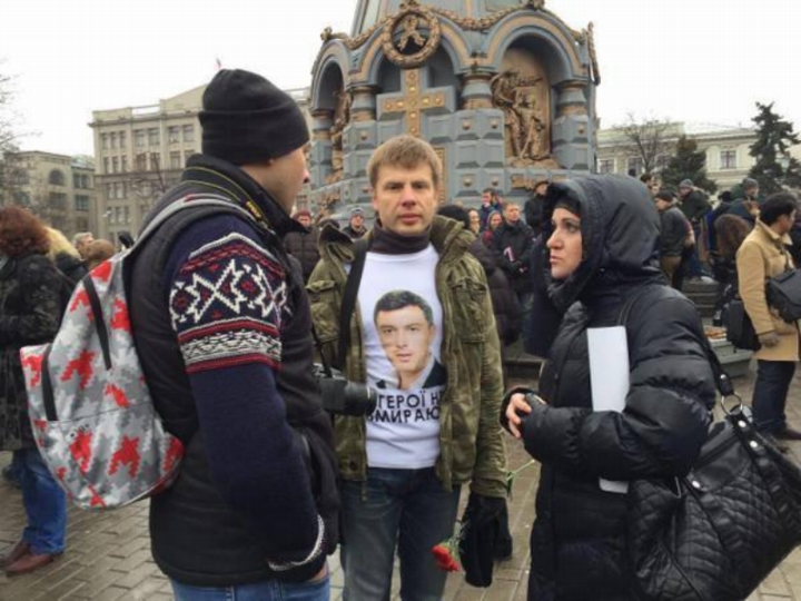 Oleksij Hončarenko na smutečním pochodu.