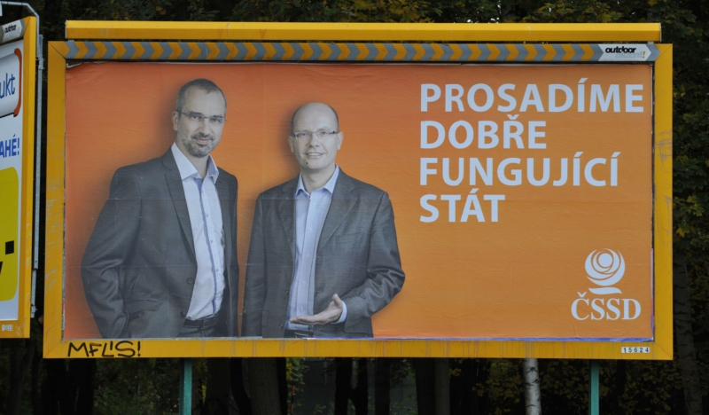 Billboard k předčasným volbám do Poslanecké sněmovny v Olomouci.