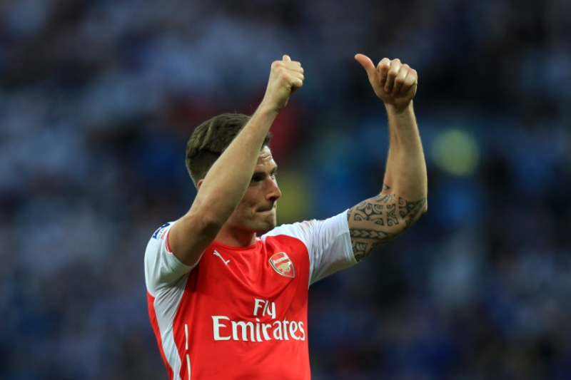 Olivier Giroud slaví postup s Arsenalem do finále.
