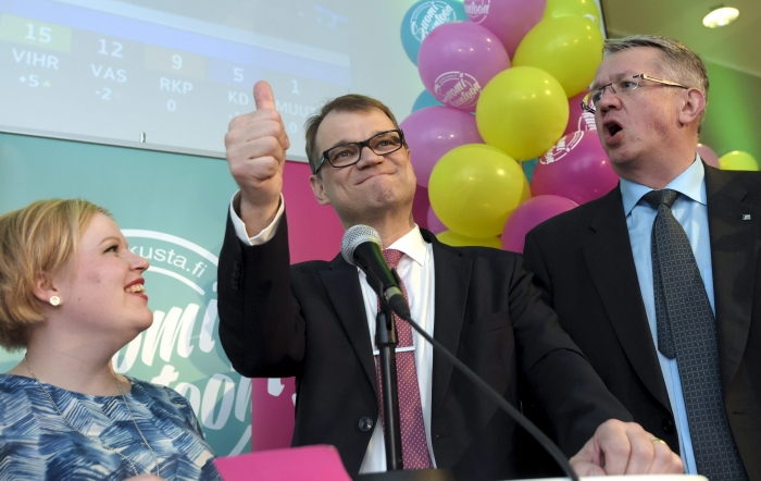 Radující se podnikatel Juha Sipilä.