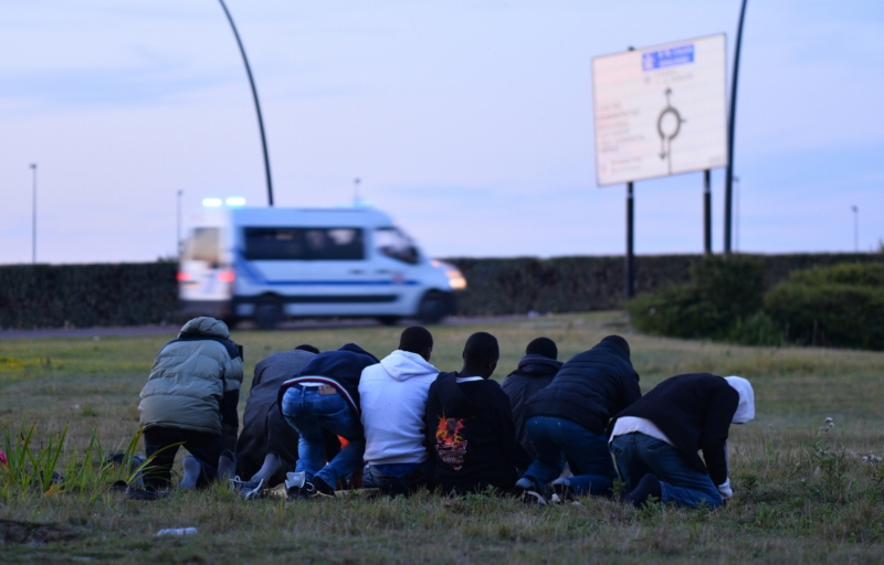 Uprchlíci v Calais.
