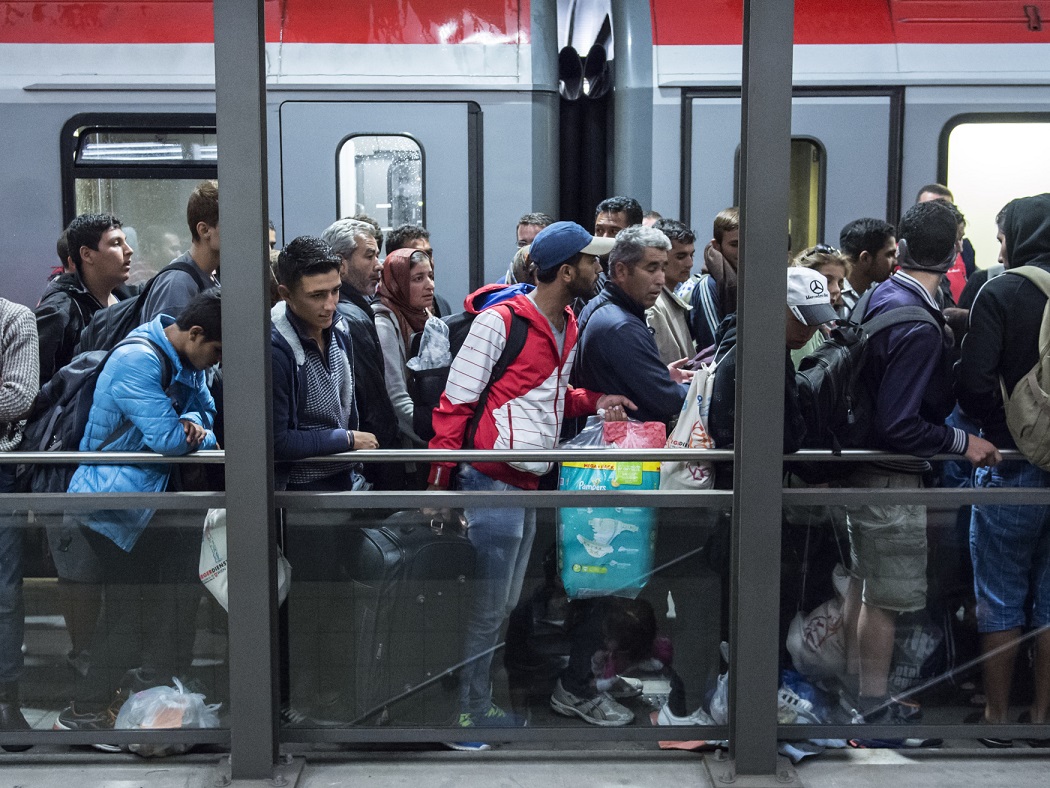 Migranti na nádraží v Mnichově.