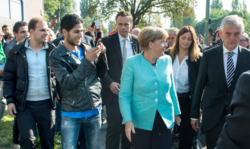 Německá kancléřka Angela Merkelová přijela ve čtvrtek navštívit německý úřad pro imigranty.