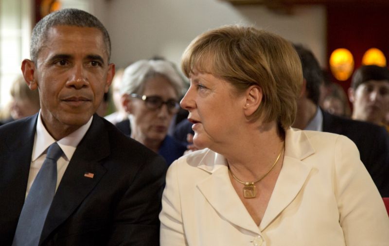Barack Obama s Angelou Merkelovou.