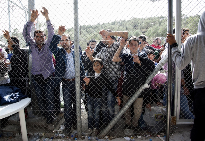 Migranti v řeckém táboře.