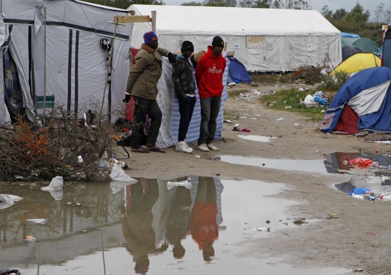 Uprchlíci v Calais.