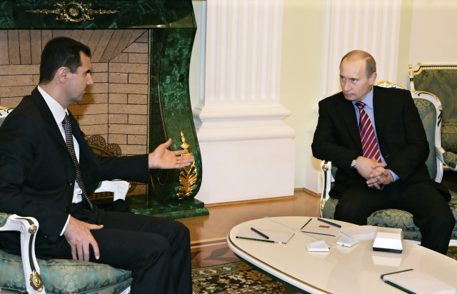 Asad a Putin na jednání v roce 2006.