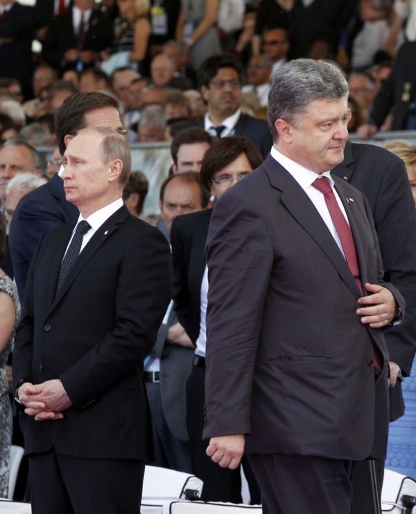 Vladimir Putin (vlevo) a Petro Porošenko.
