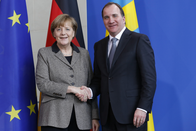 Premiér Löfven s německou kancléřkou Angelou Merkelovou.