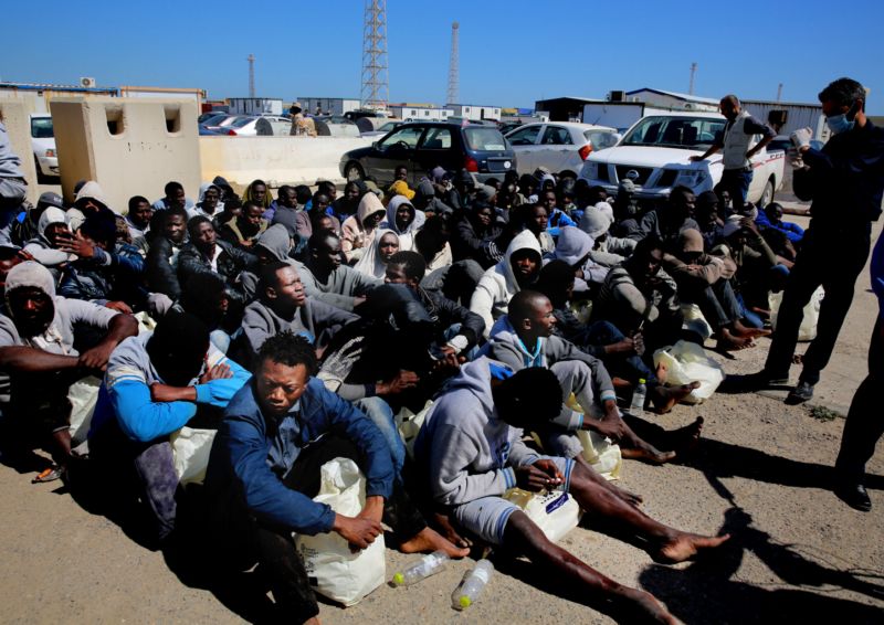 Migranti z Libye.