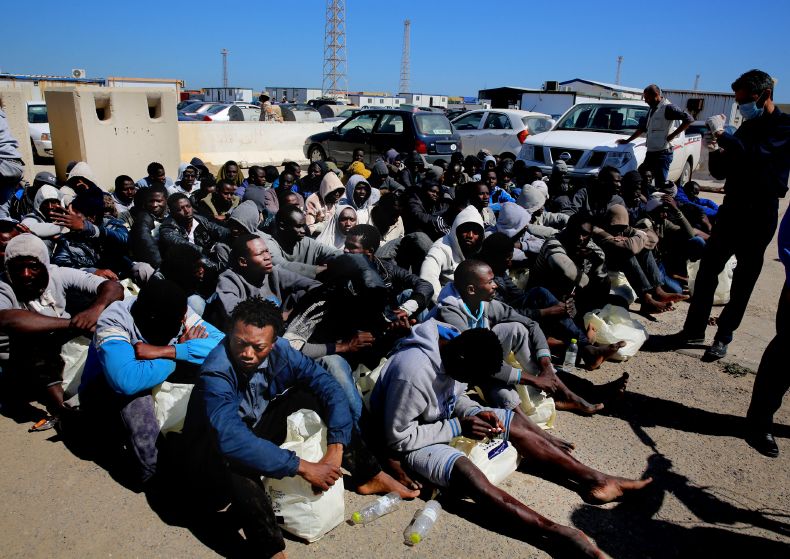 Migranti v Libyi.
