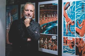 Jan Novák, výtvarník, hudebník a spoluautor Aloise Nebela na snímku s komiksovým dílem Zátopek.