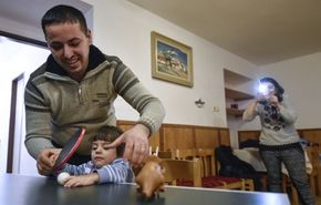 Marwán Matti s dcerou Masarrou, uprchlíci, kteří našli v ČR nový domov.