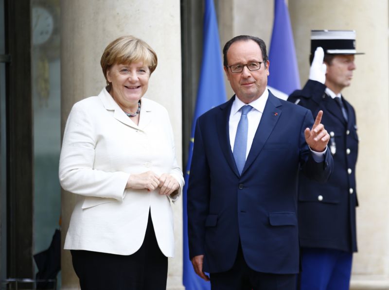 Kancléřka Angela Merkelová s prezidentem Françoisem Hollandem.