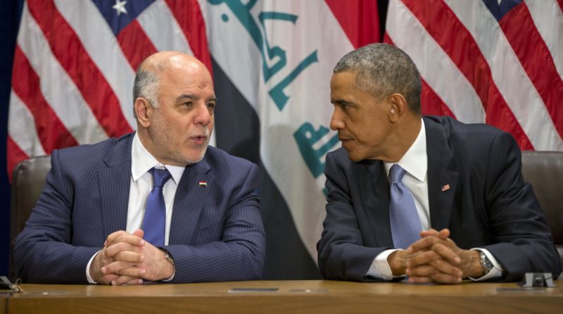 Irácký premiér Hajdar Abádí (vlevo) a americký prezident Barack Obama. .