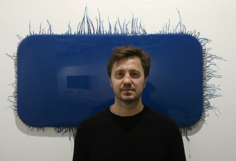Milan Houser.