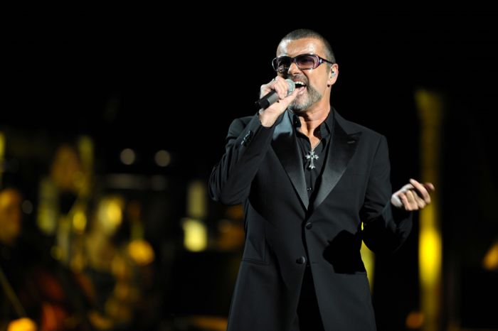 Zpěvák George Michael.