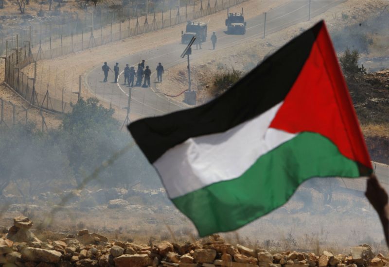 Palestinská vlajka na hranici s Izraelem (ilustrační foto).