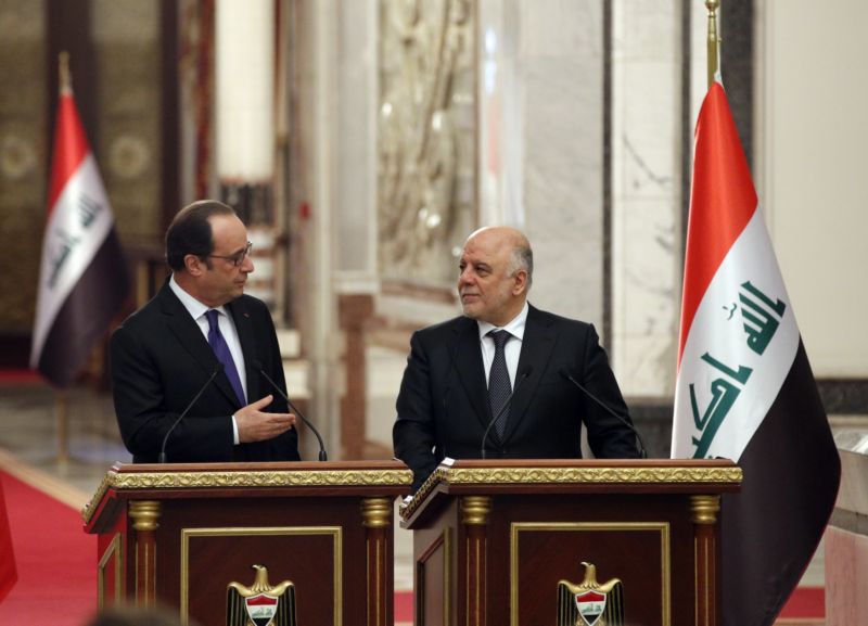Francouzský prezident Francois Hollande a irácký premiér Hajdar Abádí.