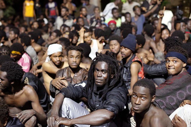 Migranti ve Španělsku.