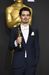 Damien Chazelle (Nejlepší režie filmu La La Land) v elegantním obleku.