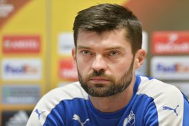 Matúš Kozáčik.