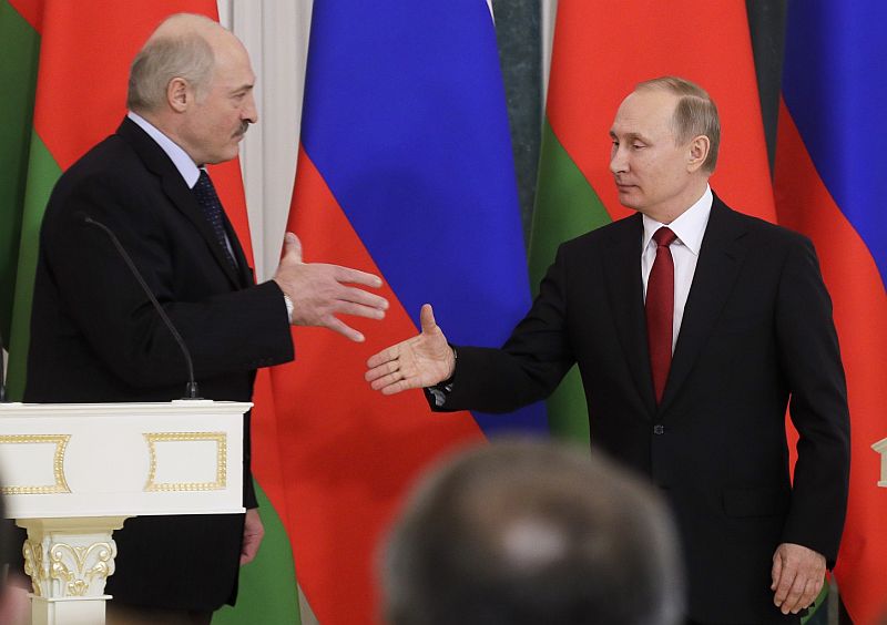 Běloruský prezident Alexandr Lukašenko a Vladimir Putin.