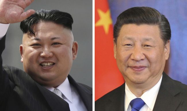 Zleva vůdce KLDR Kim Čong-un a čínský prezident Si Ťin-pching.