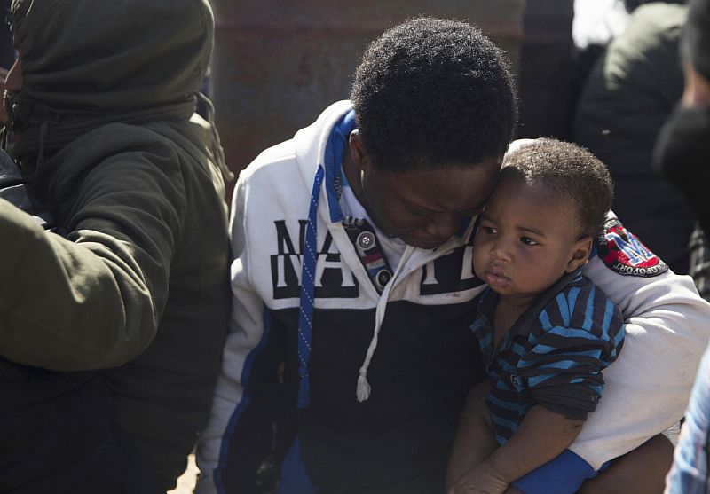 Libyjští migranti.