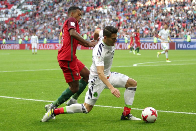 Portugalci v zápase s Mexikem, který skončil 2:2. Portugalci v zápase s Mexikem, který skončil 2:2.