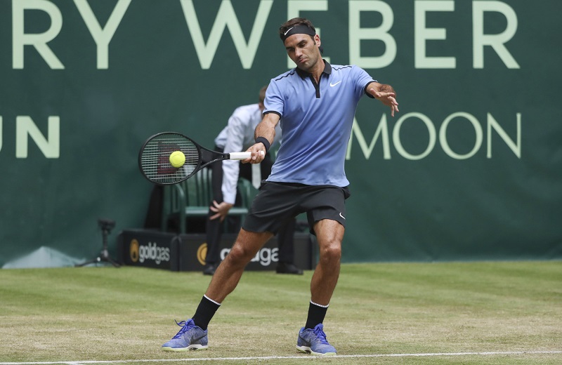 Švýcarský tenista Roger Federer. Švýcarský tenista Roger Federer.