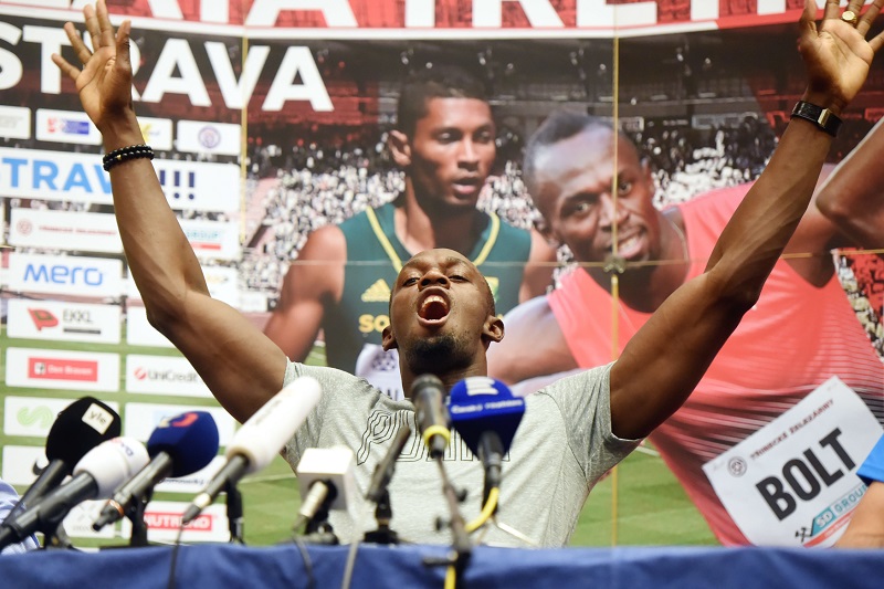 Jamajský sprinter Usain Bolt na tiskové konferenci.