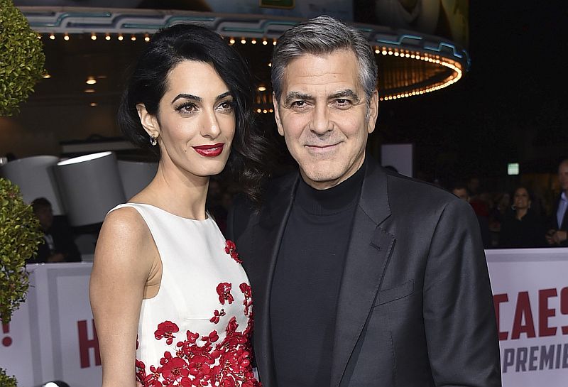 George Clooney a jeho manželka Amal. George Clooney a jeho manželka Amal.