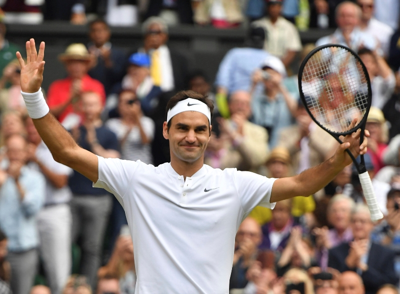 Vítěz semifinále Wimbledonu Roger Federer a jeho radost. Vítěz semifinále Wimbledonu Roger Federer a jeho radost.