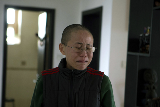 Liou Sia, vdova po nositeli Nobelovy ceny za mír, Liou Siao-poovi. Liou Sia, vdova po nositeli Nobelovy ceny za mír, Liou Siao-poovi.