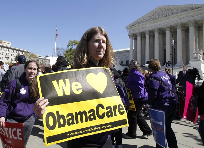 Příznivci zdravotní reformy Obamacare.