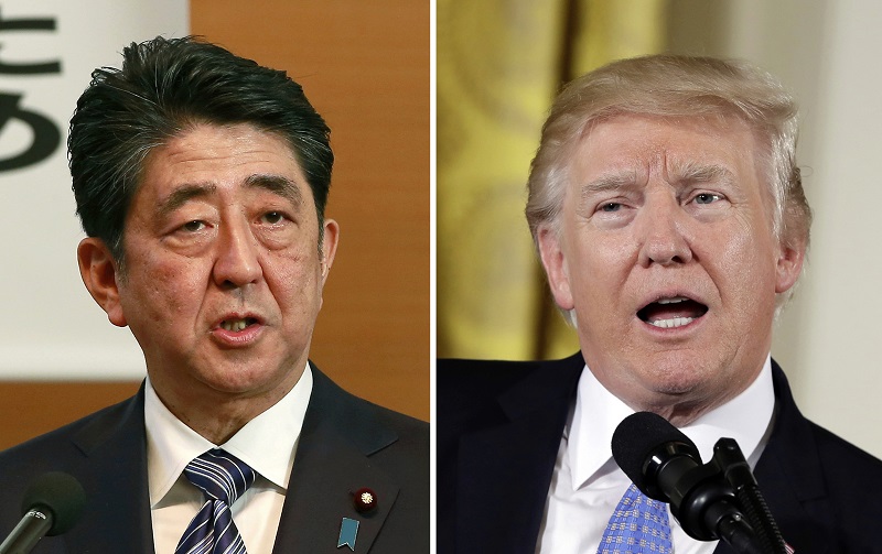 Japonský premiér Šinzó Abe a americký prezident Donald Trump.