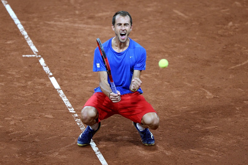 Český tenista Lukáš Rosol a jeho radost po vyhraném zápasu nad Holanďanem Haasem v Davis Cupu.