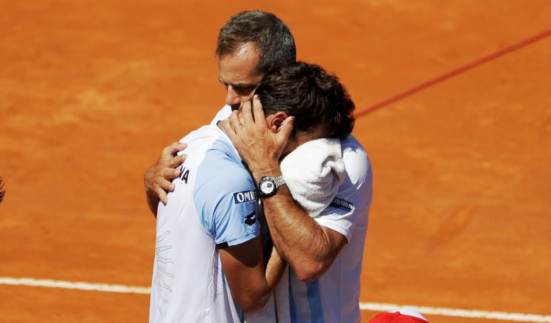 Guido Pella s kapitánem Danielem Orsanicem.